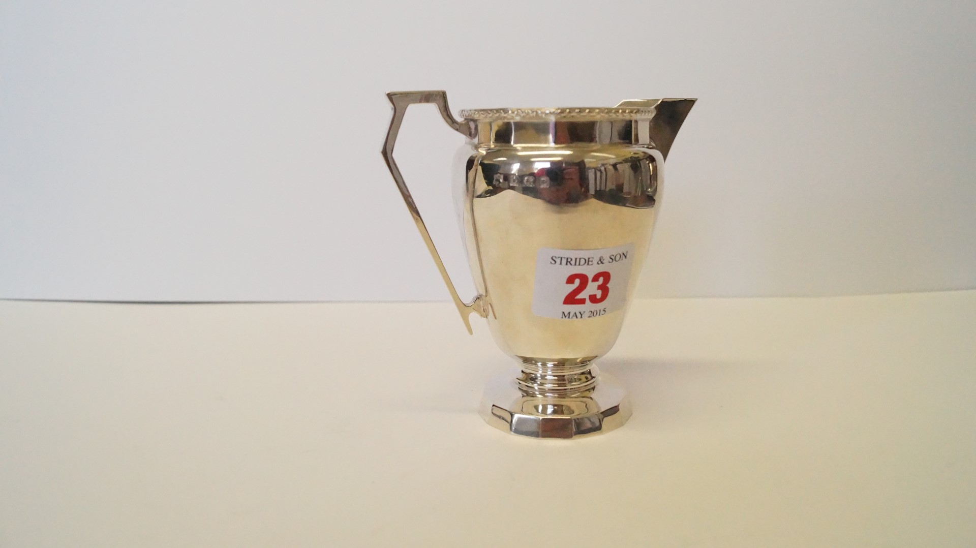A silver cream jug, by William Neale & Son Ltd, Birmingham 1929, 10cm, 103g.