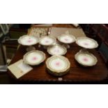 A pair of late 18th/early 19th century English porcelain trios and matching saucer dish,