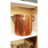 An early Victorian copper twin-handled stockpot and cover, 32cm high. 
 Condition Report: Overall