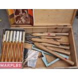 A cased set of six Marples wood turning tools; together with other chisels; two books; etc.