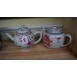 Two Chinese famille rose teapots and covers, largest 14.5cm high. Condition Report: Flower painted