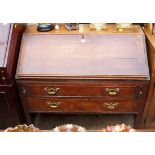 A George III oak bureau on stand, 94.5cm wide.