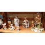 Three Capodimonte figures; and others. Condition Report: Both oriental pieces have chips.  The