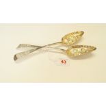 A pair of George III silver 'berry' spoons, by H S, with later decoration, 144g.