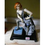 A Royal Crown Derby lady, on fitted wood stand, total height 29cm. Condition Report: No visible