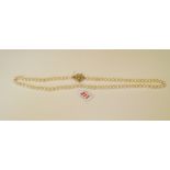 A single long row of eighty baroque cultured pearls,