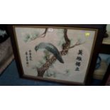 A Chinese silk needlework panel of a bird of prey in a tree, with three columns of script,