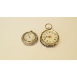 A continental .800 silver fob watch; together with a similar .935 silver fob watch.
