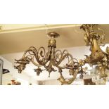 An antique five branch ceiling light; with glass shades. Condition Report: This light is intact