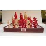 A Chinese export ivory part chess set, 19th century, red stained and natural,