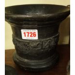 An antique bronze mortar, 14cm high.