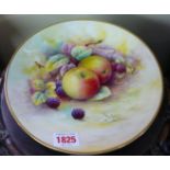 A Minton fruit painted cabinet plate, by A Holland, 23cm diameter.