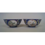 A pair of Chinese blue ground medallion bowls, Daoguang seal marks, each decorated with four