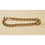 A 9ct gold curb link bracelet, 29.5g.