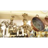 An old cast brass three branch ceiling light. Condition Report: This light will require re-wiring,