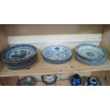 A set of nine Chinese blue and white plates, 19th century,