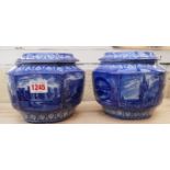A pair of Maling Ware Ringtons tea caddies and covers, 14cm high, (crack to one).