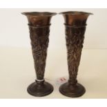 A pair of Edwardian silver trumpet flower vases, by W Comyns, London 1902, having repousse floral