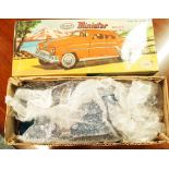 An Amar Toy Minister Delux tin plate car, boxed.