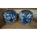 A pair of Chinese blue and white ginger jars, 18th century, each painted with dragons and clouds,