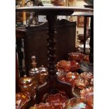 A Victorian mahogany circular tripod table, with barley twist column, 53.5cm diameter.