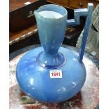 A Christoper Dresser style blue glazed pottery ewer, possibly by Linthorpe, 27cm high,