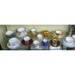 A small quantity of 19th century and later continental porcelain cups and saucers.