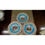 A set of three late 19th century Mintons cabinet plates, two painted with a fox and prey, the