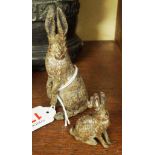 A cold painted bronze hare, in the manner of Franz Bergman, stamped 'Geschutz',