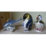 Three Royal Crown Derby imari paperweights, comprising: dolphin, penguin and puffin.