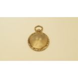 An 18ct yellow gold engine turned locket,