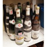 Fifteen various bottles of German white wine.