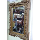 An antique gilt framed rectangular wall mirror, 93.5 x 62cm.