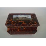 A rare early Victorian tortoiseshell tea caddy, the hinged top unusually inset with a painted plaque