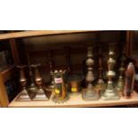 A quantity of brass candlesticks; trench art; and others.