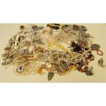 A bag of mixed costume jewellery.