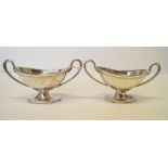 A pair of Victorian silver twin handled salts, by William Evans, London 1880,