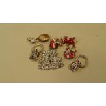 A small selection of Butler and Wilson enamel and glass set costume jewellery.