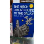 ADAMS (Douglas): 'The Hitch Hiker's Guide to the Galaxy..'; London, Arthur Barker Limited, 1979.