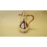 A George III silver baluster coffee pot, by Charles Wright , London 1769, 26cm, 693g. Condition