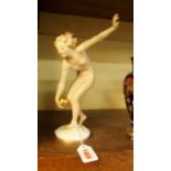 A Hutschenreuther Art Deco style figure of a female nude, impressed 'K Tutter', 24cm high.