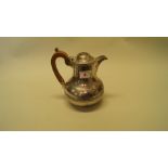 A silver hot water jug, by D & J Wellby Ltd, 688g all in. Condition Report: Missing lid finial.