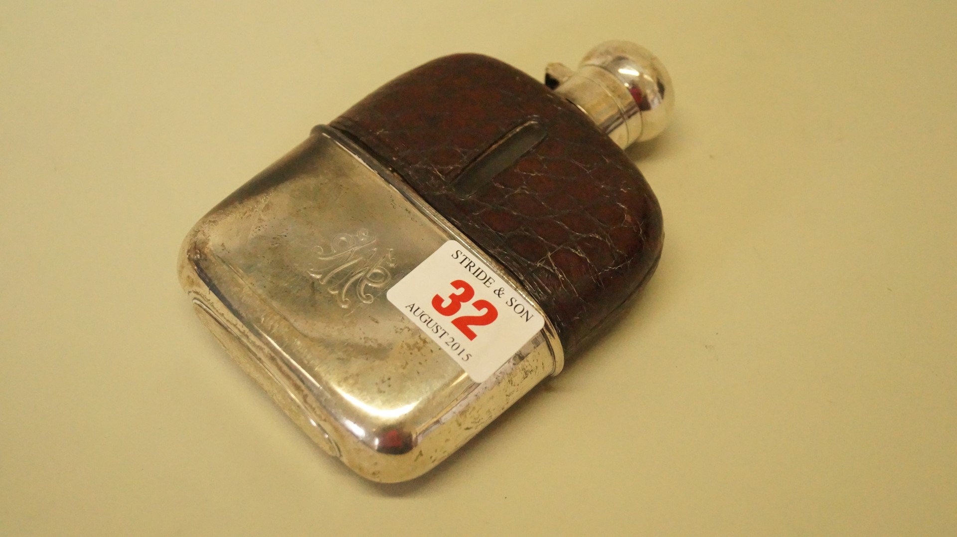 An Edwardian silver and crocodile skin mounted glass hip flask, Mappin & Webb, Birmingham 1904, 13.