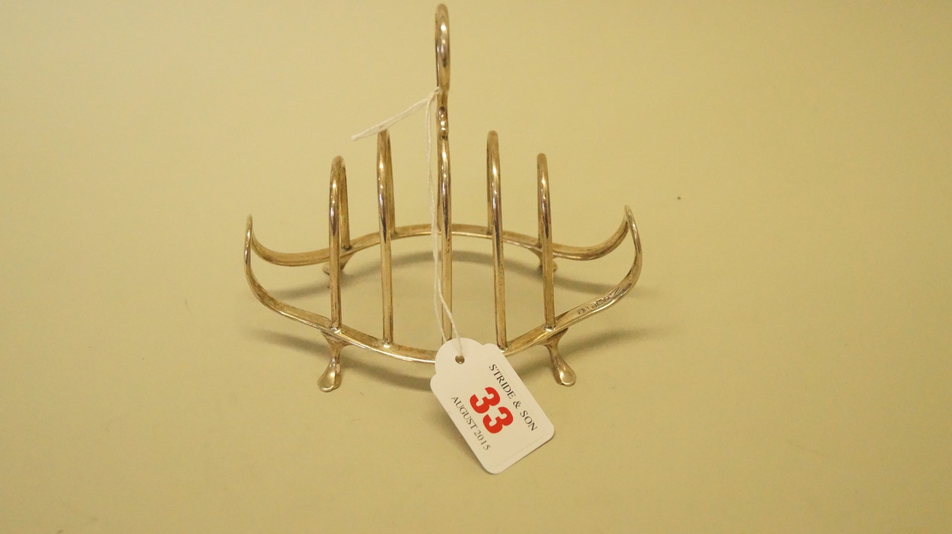 An Edwardian silver four division toast rack, by Barker Brothers, Birmingham 1903, 12.5cm, 121g.