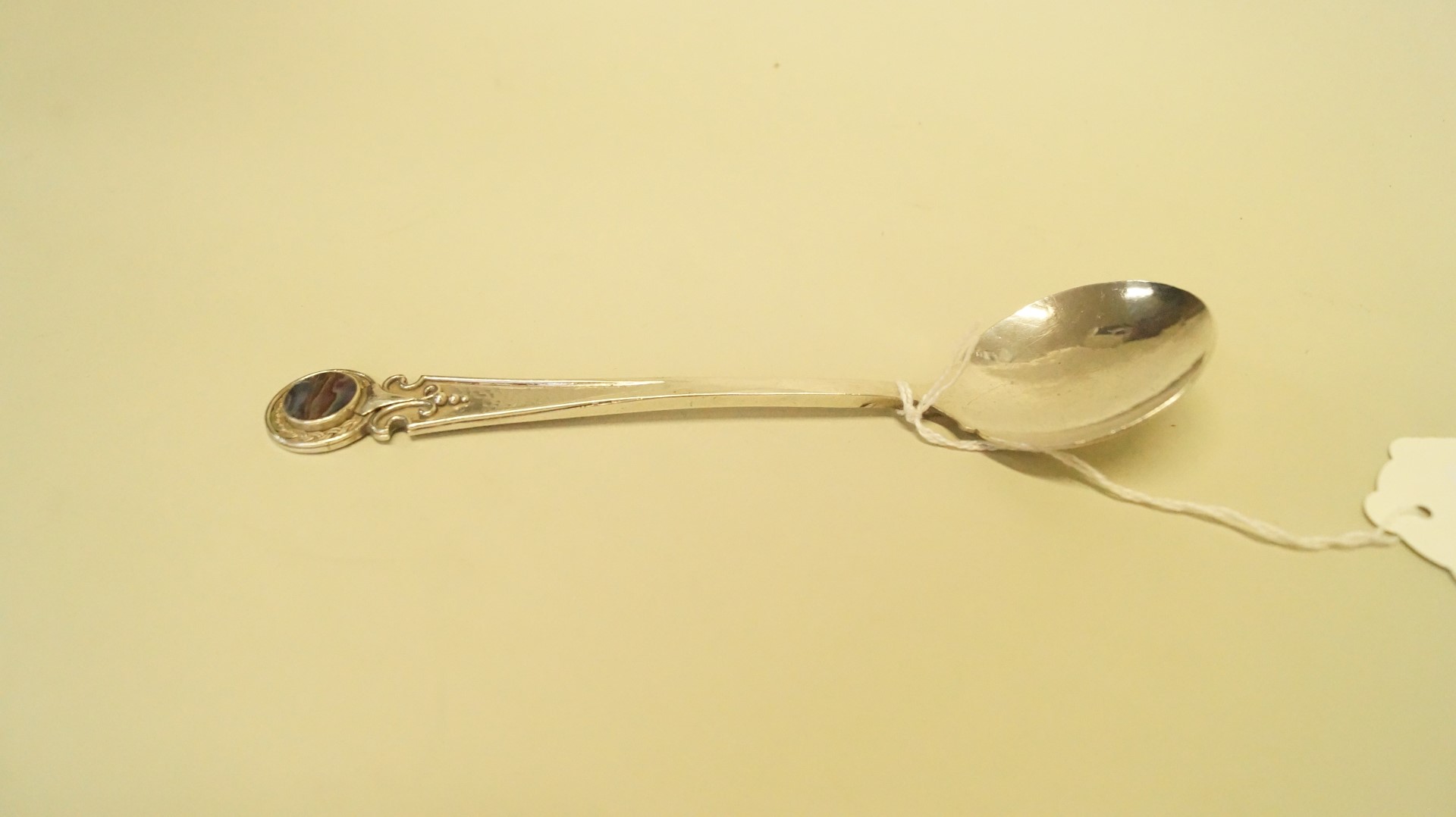 An Arts and Crafts style silver spoon, by John Sidney Reeve, Birmingham 1932,