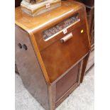 An HMV model 1616A walnut radiogram, 49cm wide.