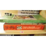 A Britains model farm part set, boxed; together with a Britains farm tractor and implements set,