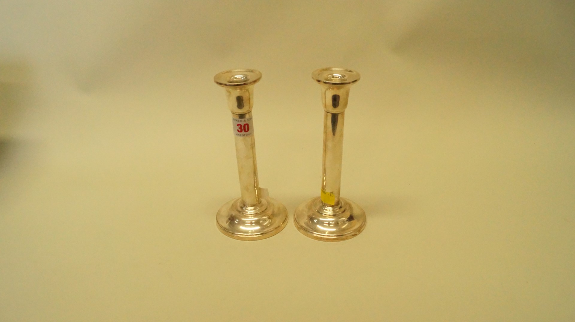 A pair of silver candlesticks, by B & Co, Birmingham 1998, 18.5cm, filled.