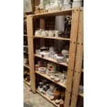 A large quantity of Midwinter, Hornsea, Meakin and Susie Cooper pottery, (five shelves).