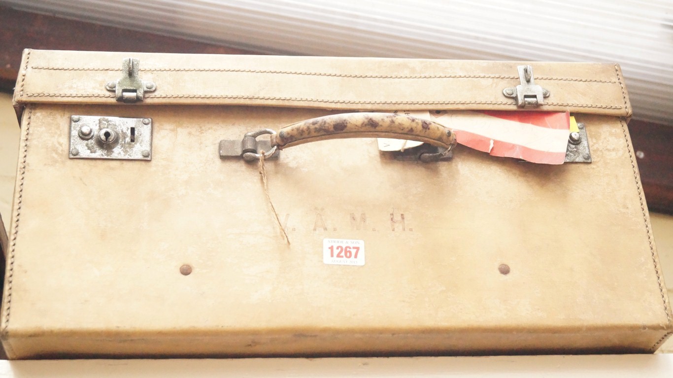 A vintage vellum suitcase; together with another old leather suitcase. - Image 2 of 3